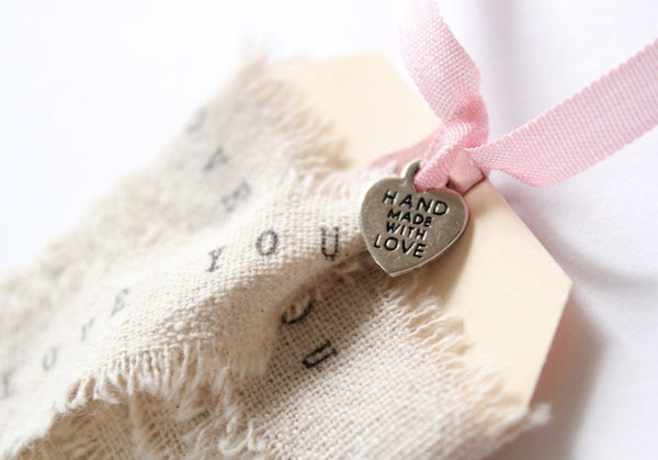 Wedding Favor Tags . 100 Heart Charms . Hand Made With Love . metal heart tags . silver .  wedding favors charms. sewing charms
